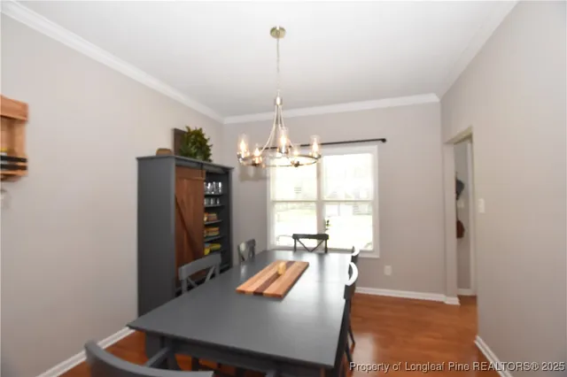 a bathroom with a toilet a sink and glass door