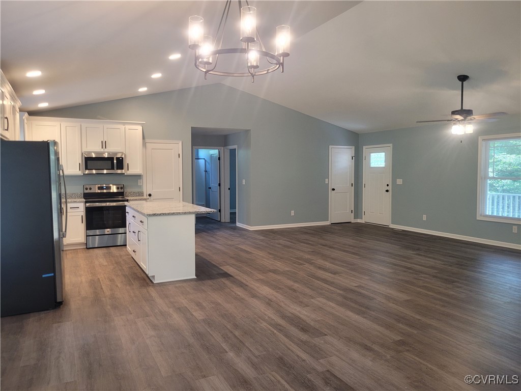 4875 Farmville Road Farmville, VA 23901 - Photo 7 of 13 Kitchen featuring vaulted ceiling, white cabinetry