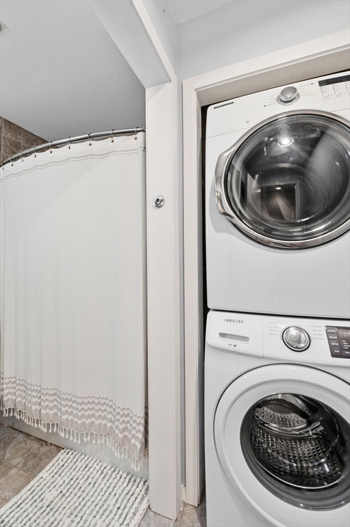 60 Brackett Place, Unit D Marblehead, MA 01945 - Photo 25 of 30 a utility room with dryer and washer