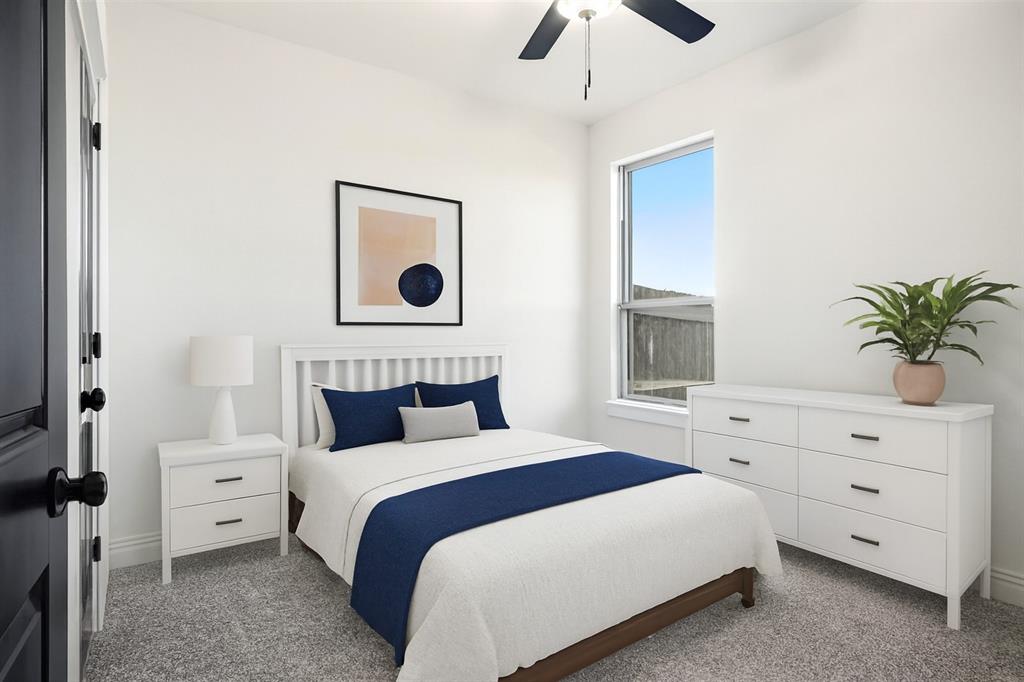 218 Legacy Boulevard Weatherford, TX 76086 - Photo 13 of 20 a bedroom with a bed and a window