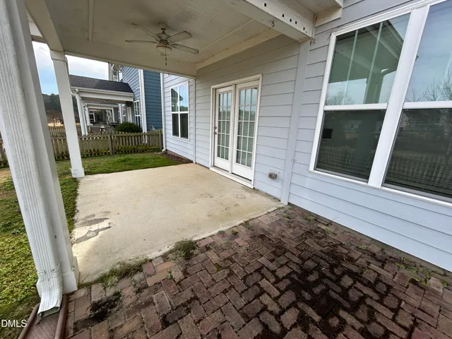 a view of a yard next to a yard