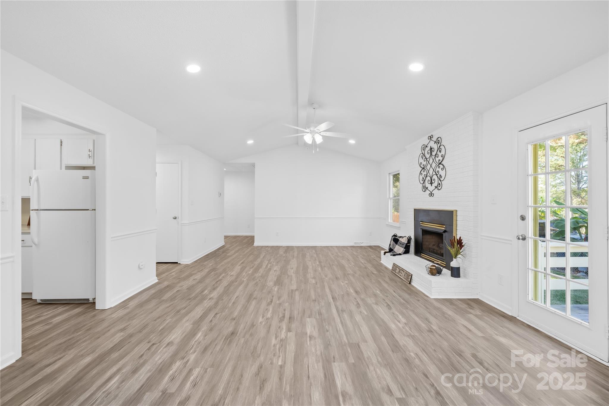 700 Chestnut Lane Matthews, NC 28104 - Photo 15 of 39 a view of livingroom with furniture and wooden floor