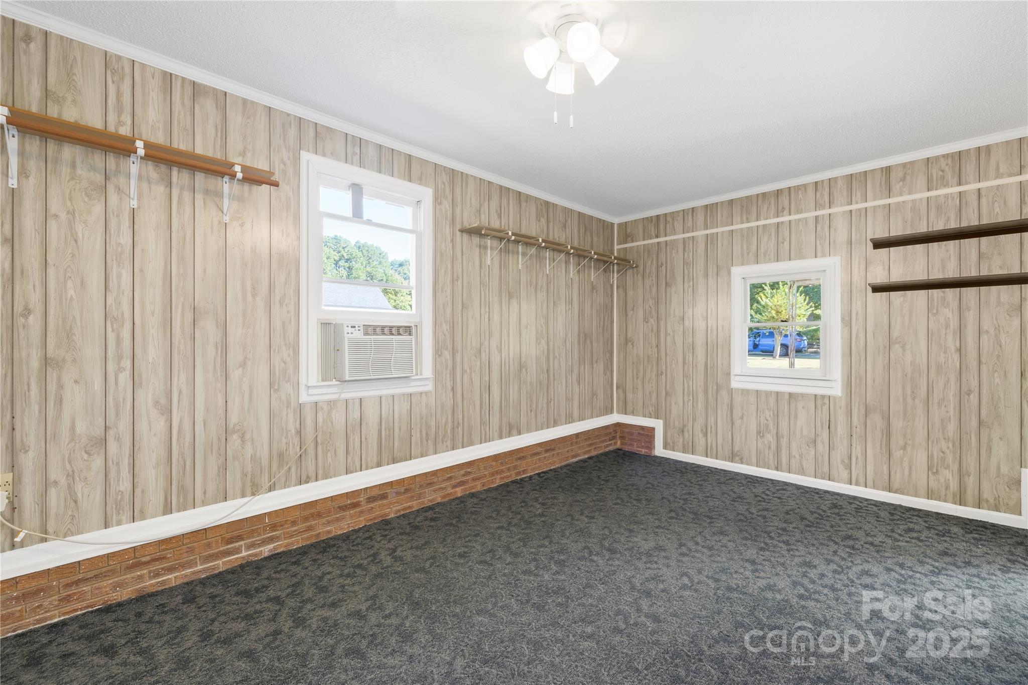 700 Chestnut Lane Matthews, NC 28104 - Photo 29 of 39 a view of an empty room with a window