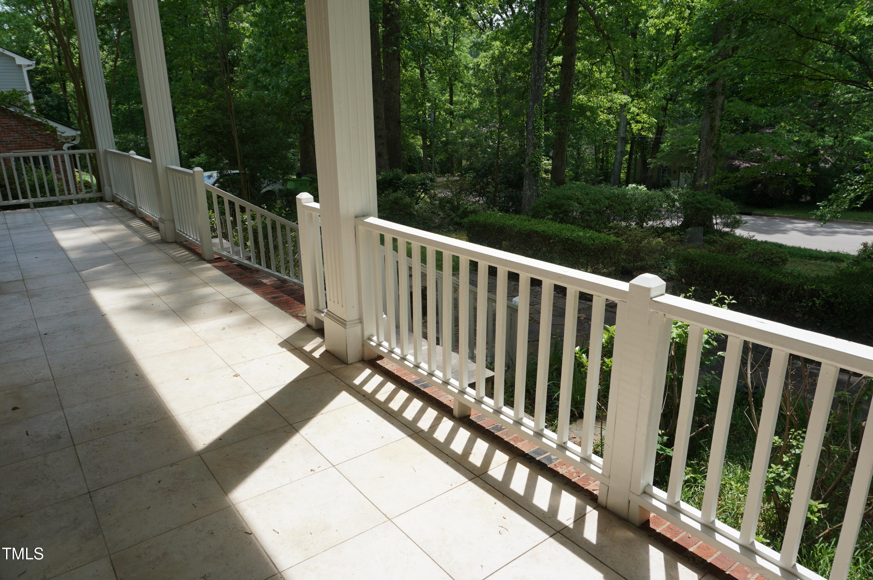 4113 Oak Park Road Raleigh, NC 27612 - Photo 8 of 62 a view of a balcony with wooden floor