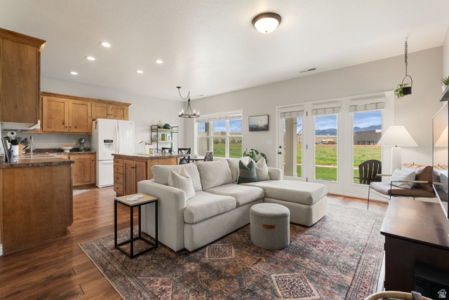 2382 South 1275th Street West Logan, UT 84321 - Photo 9 of 36 Open and spacious kitchen/family room area!