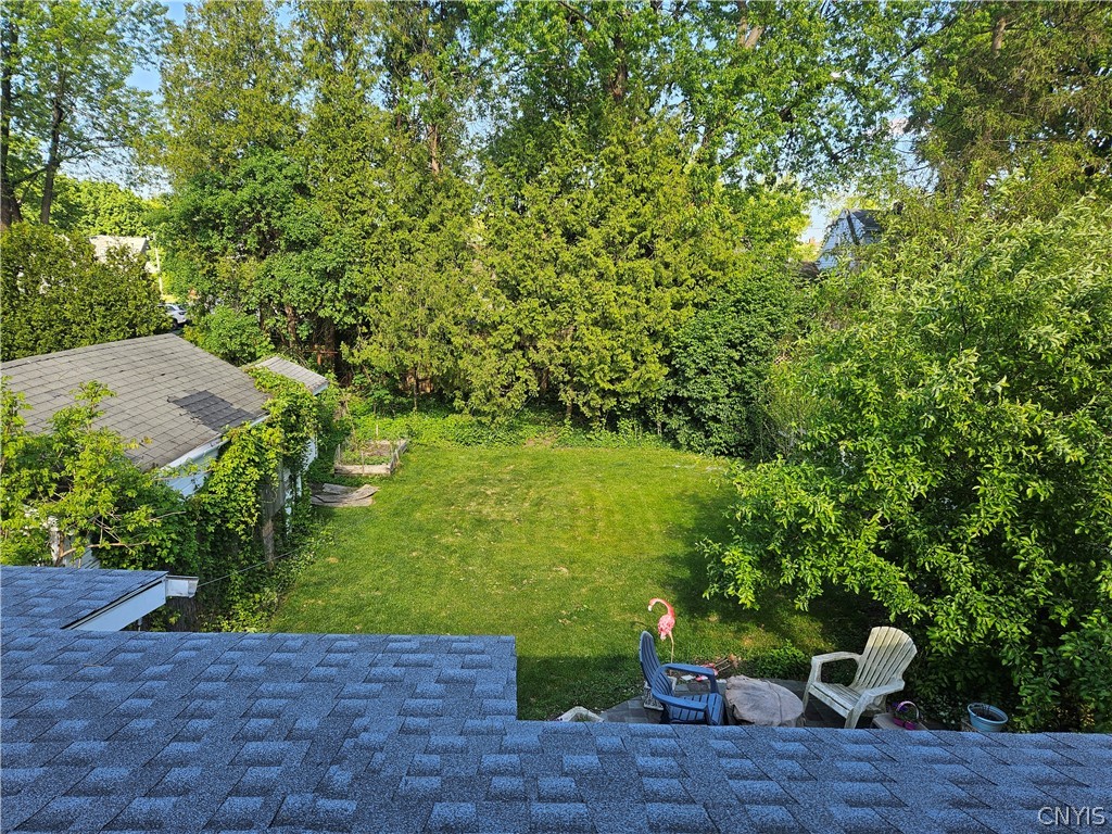 214 Revere Road DeWitt, NY 13214 - Photo 15 of 17 Picture taken from upstairs bathroom window showing off the new architectural shingle roof and PRIVATE back yard