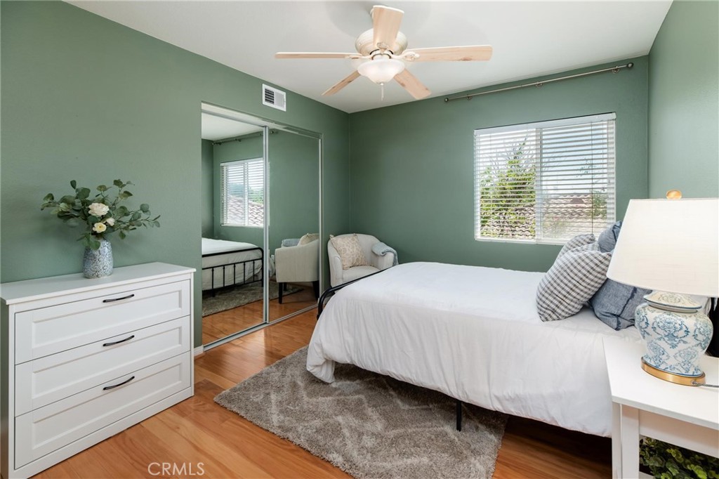 789 Glenhart Place Fallbrook, CA 92028 - Photo 27 of 40 a bedroom with a bed and a dresser