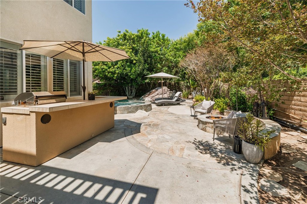 789 Glenhart Place Fallbrook, CA 92028 - Photo 32 of 40 a view of a swimming pool with a patio