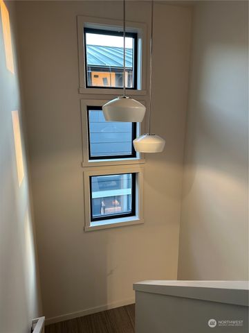 a view of a door and chair in the room