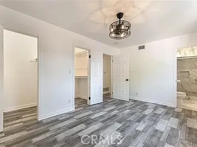 a view of an entryway with kitchen
