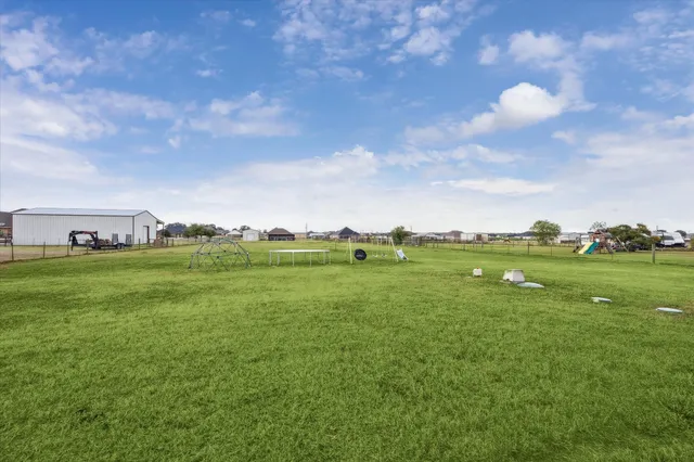 a view of a green field with lots of green space