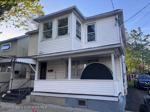 130 Willow Street Dunmore, PA 18512 - Photo 1 of 7 a front view of a house with a garage