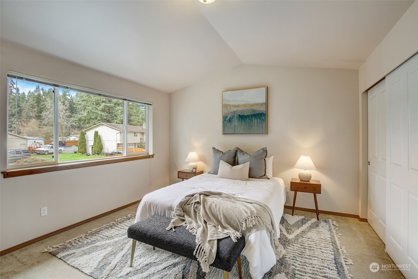 13413 Meadow Road Everett, WA 98208 - Photo 15 of 27 a bedroom with a bed and a window