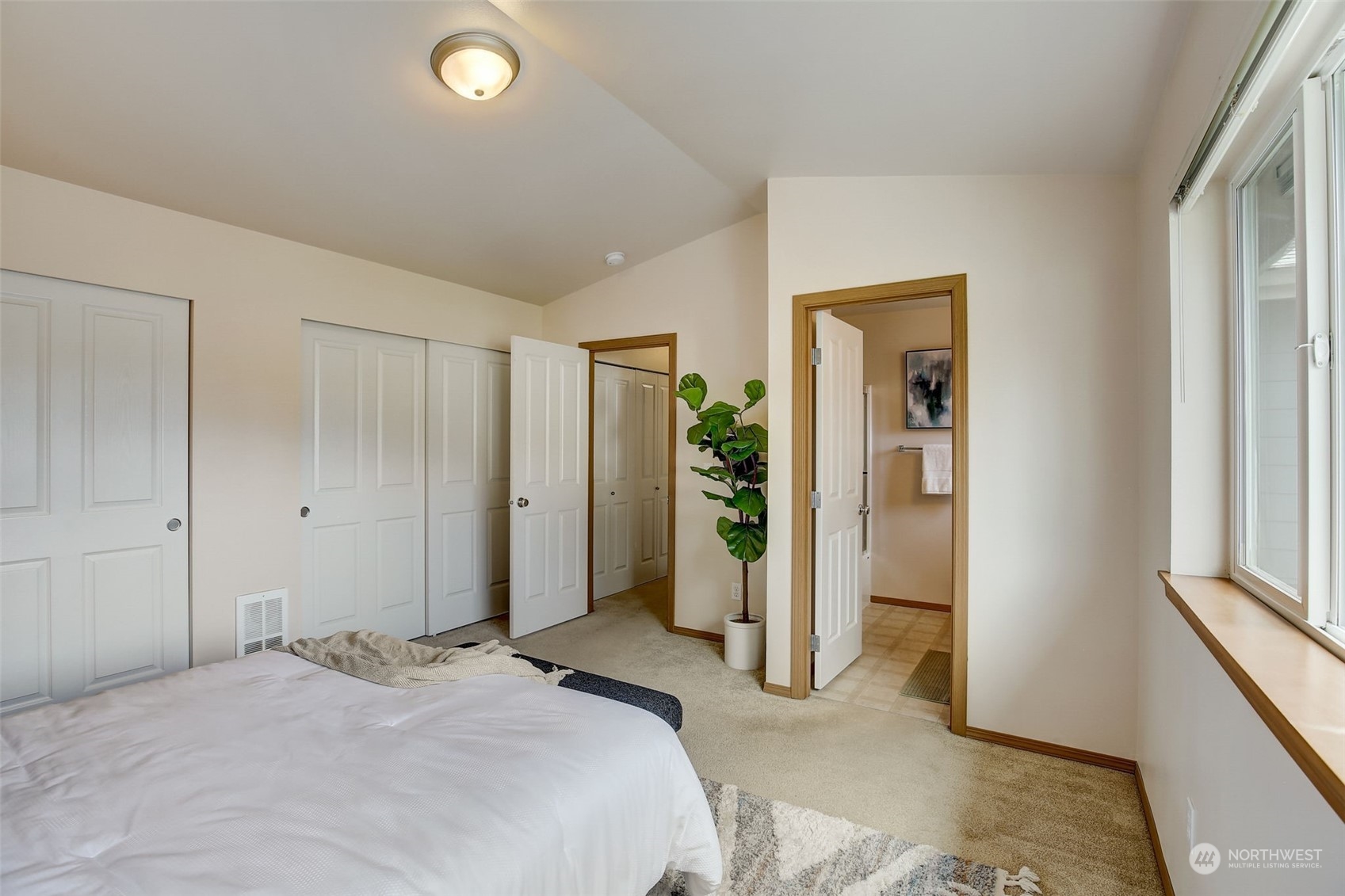 13413 Meadow Road Everett, WA 98208 - Photo 16 of 27 a bedroom with a bed and a window