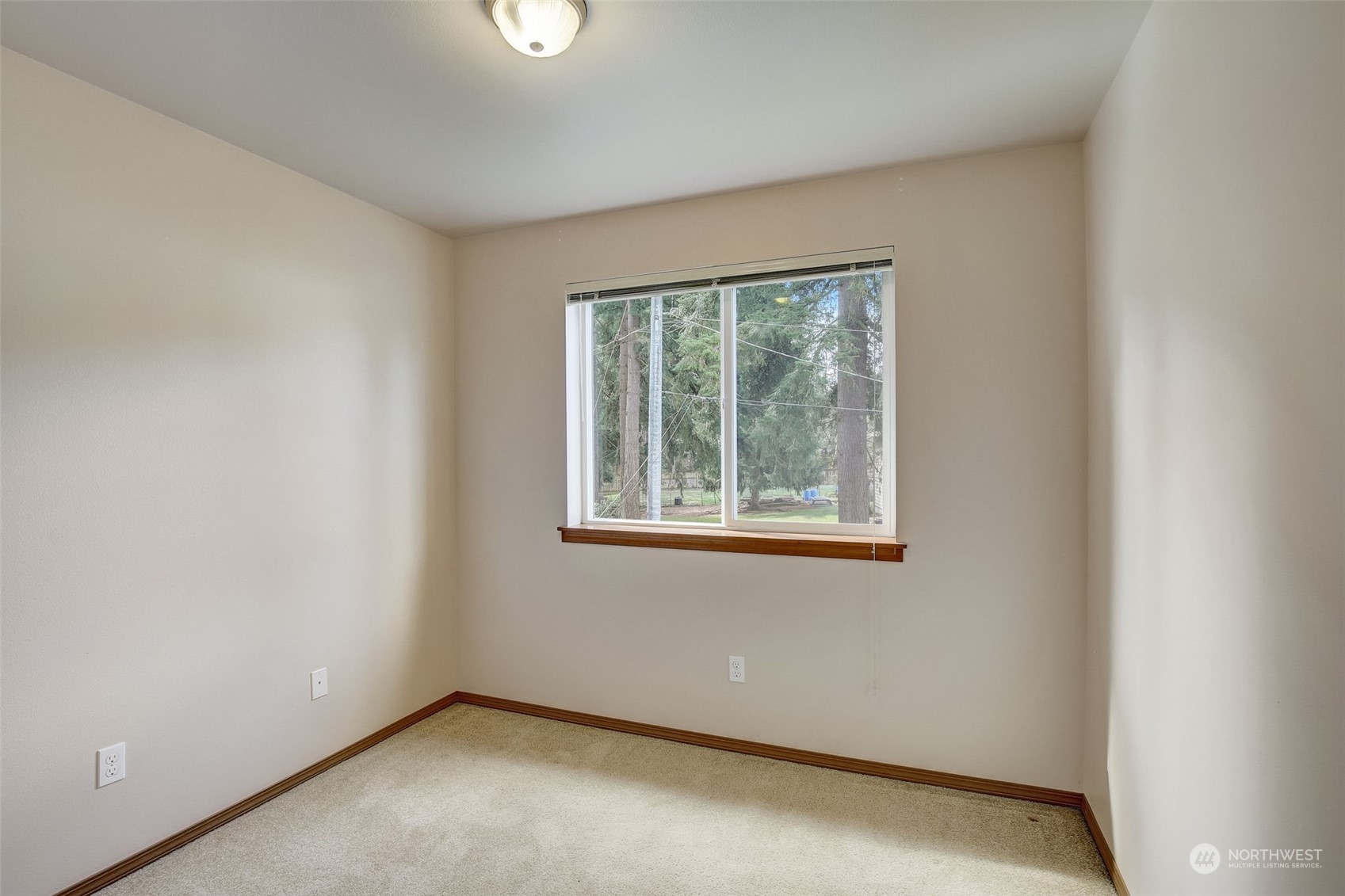 13413 Meadow Road Everett, WA 98208 - Photo 20 of 27 an empty room with a window