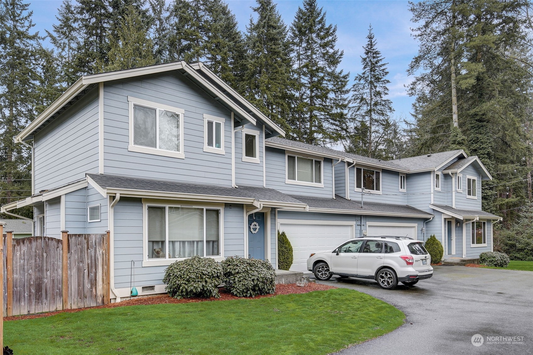 13413 Meadow Road Everett, WA 98208 - Photo 2 of 27 a car parked in front of a house