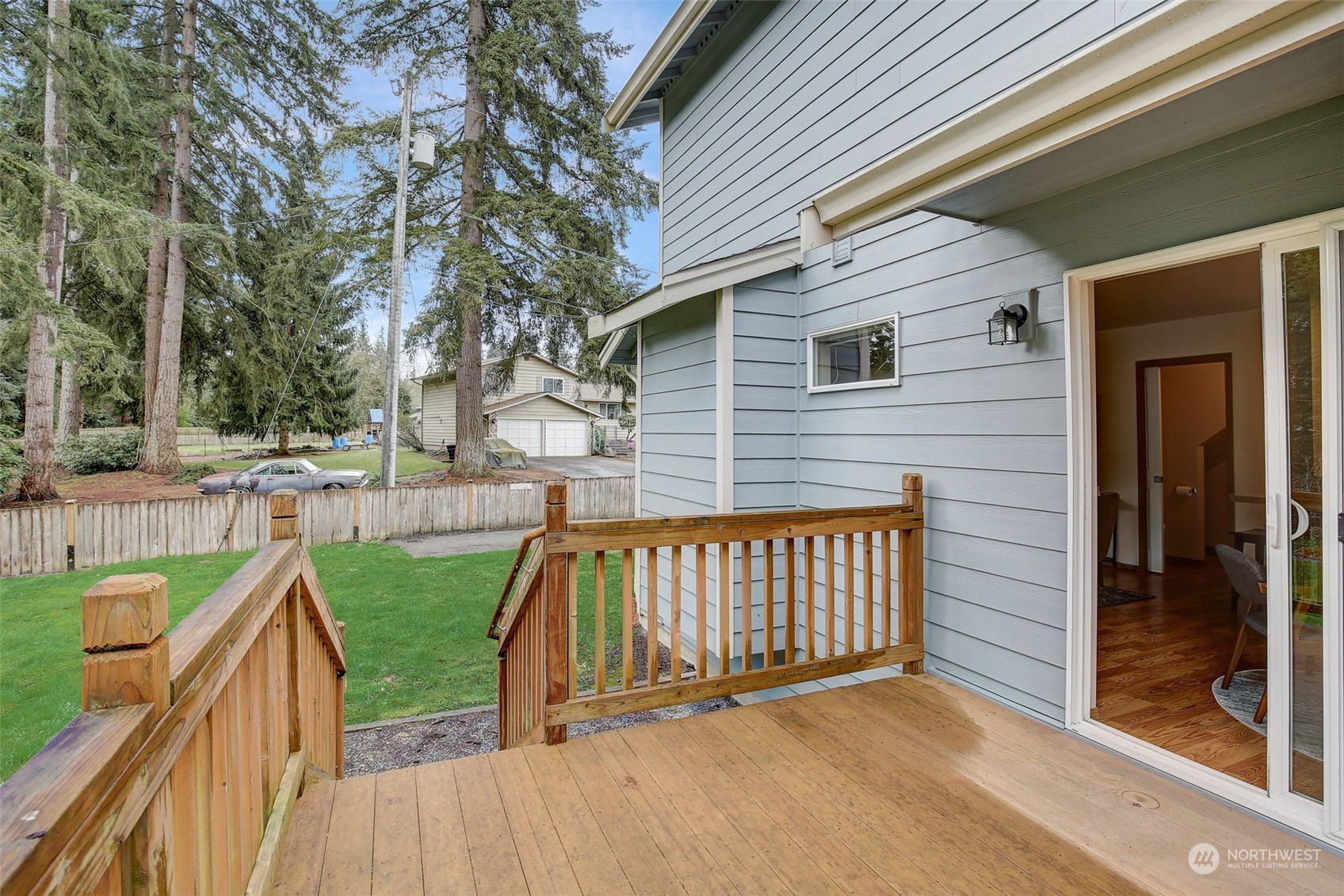 13413 Meadow Road Everett, WA 98208 - Photo 23 of 27 a view of balcony with wooden floor and fence