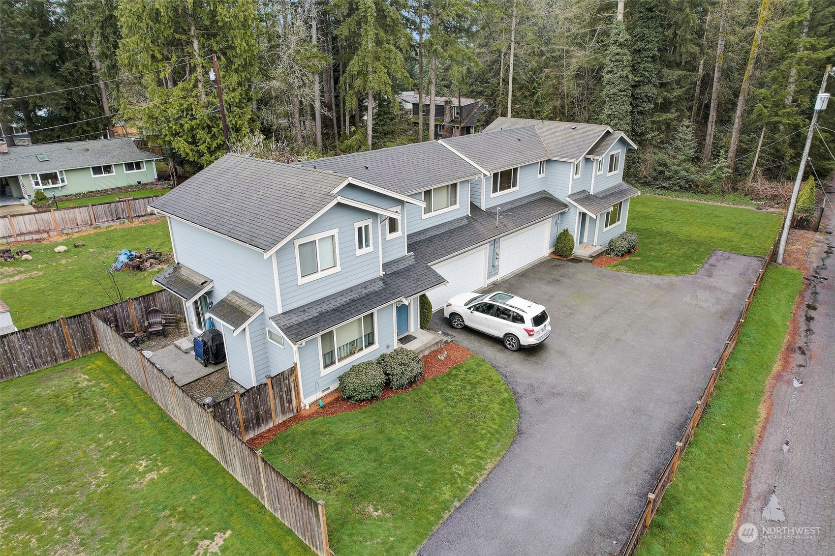 13413 Meadow Road Everett, WA 98208 - Photo 4 of 27 an aerial view of a house with a garden and swimming pool