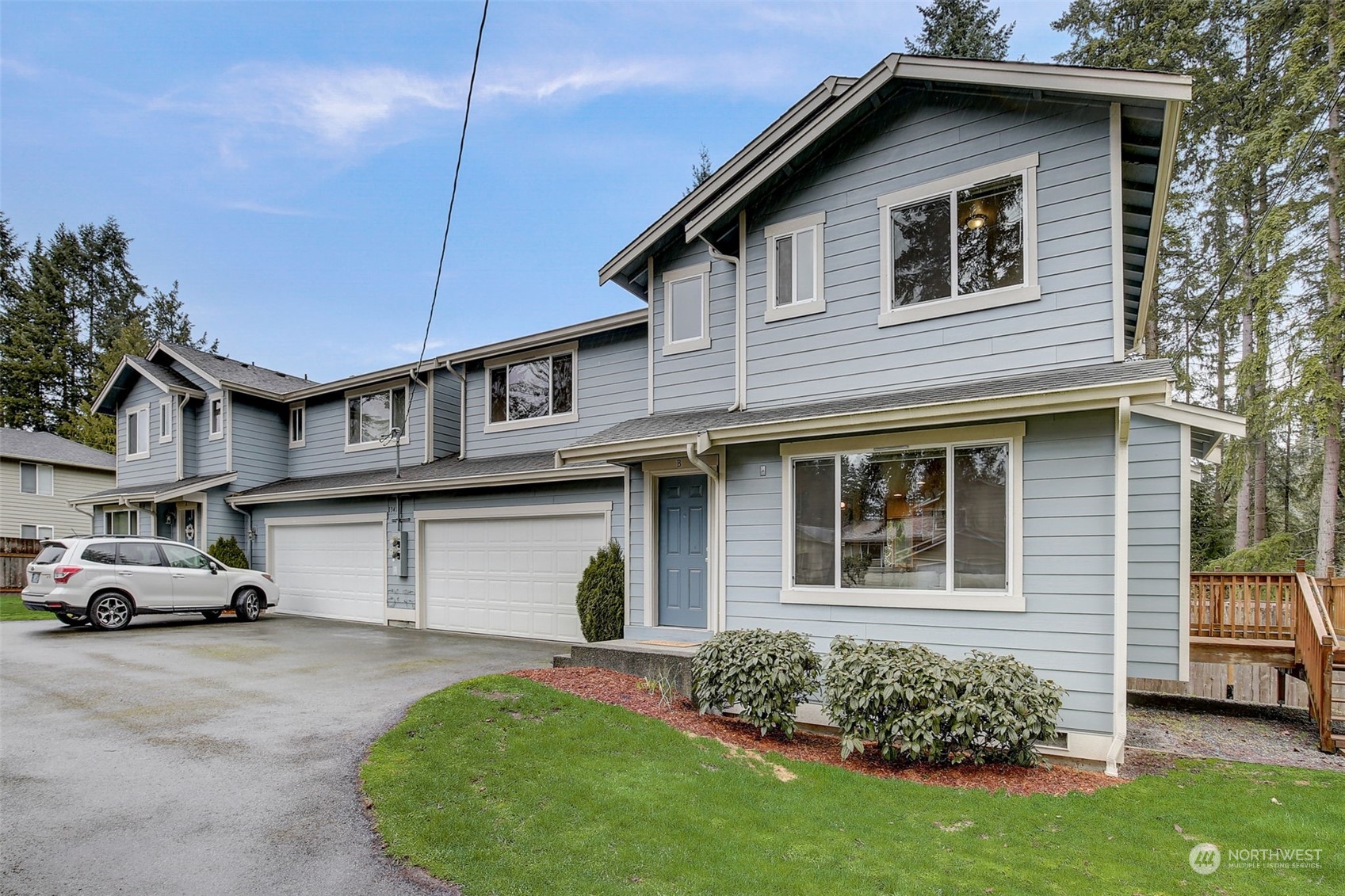 13413 Meadow Road Everett, WA 98208 - Photo 6 of 27 a car parked in front of a house