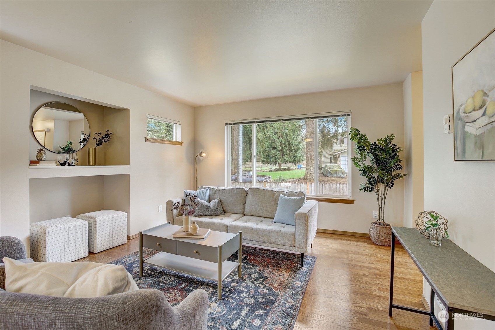 13413 Meadow Road Everett, WA 98208 - Photo 10 of 27 a living room with furniture and a large window