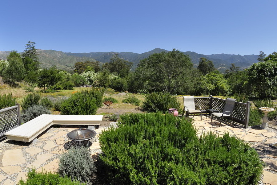 696 Cowles Road Santa Barbara, CA 93108 - Photo 13 of 14 a view of a chairs and table in the backyard