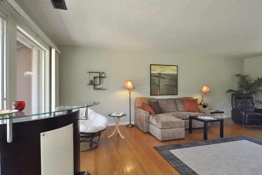 696 Cowles Road Santa Barbara, CA 93108 - Photo 3 of 14 a living room with furniture and wooden floor