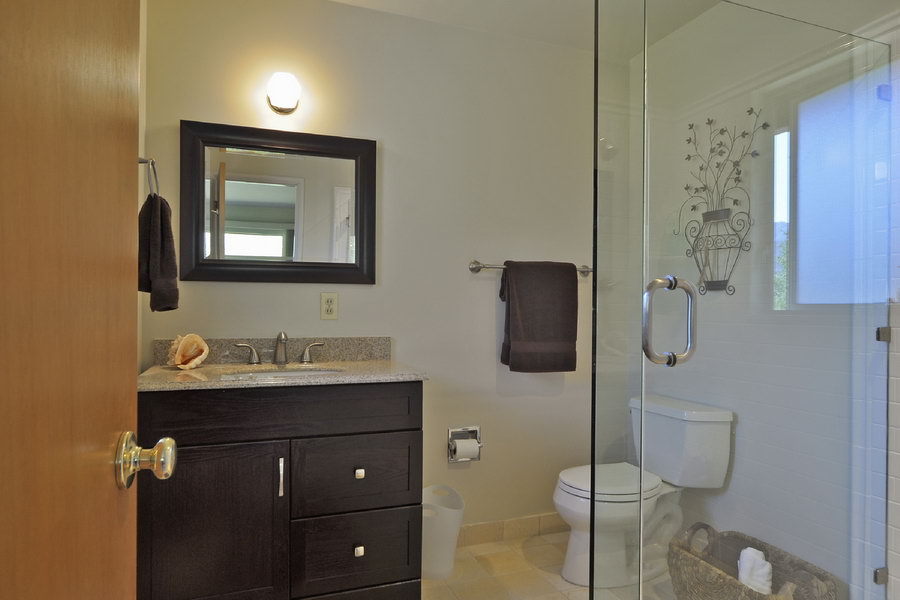 696 Cowles Road Santa Barbara, CA 93108 - Photo 9 of 14 a bathroom with a toilet sink and mirror