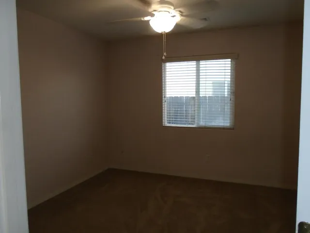 a view of a livingroom with a window
