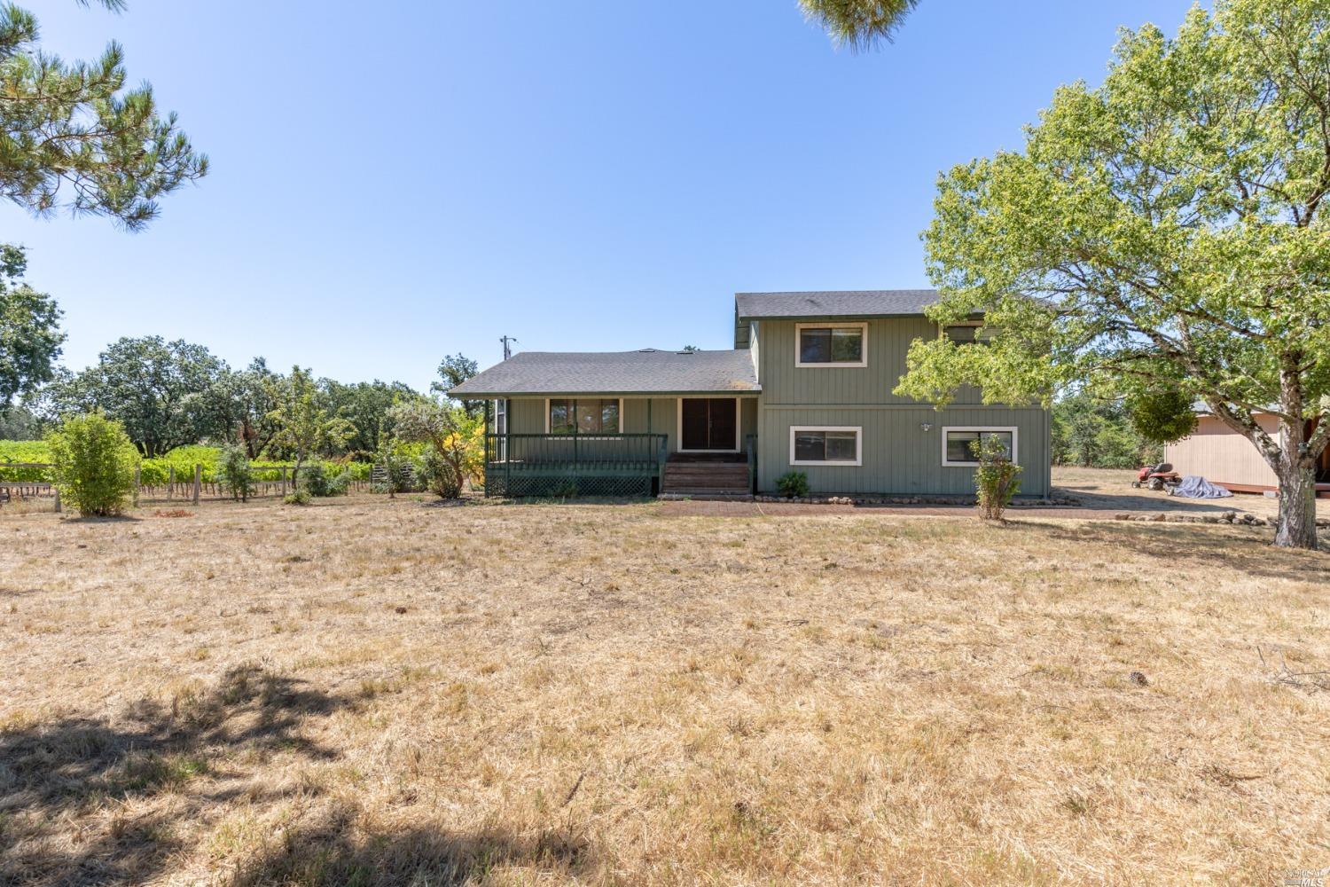 1761 Olivet Road Santa Rosa, CA 95401 - Photo 1 of 1 a front view of a house with a yard