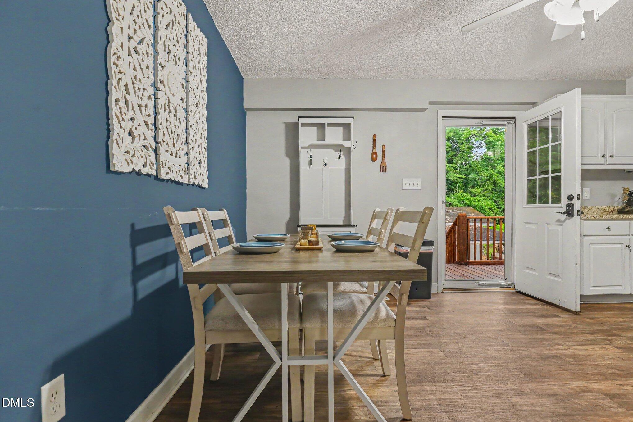 977 Stevens Mill Road Goldsboro, NC 27530 - Photo 10 of 31 a view of a dining room with furniture window and outside view