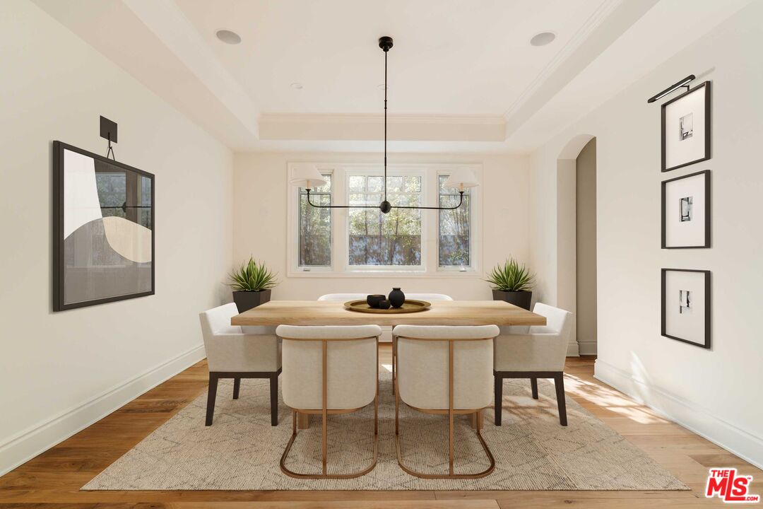 685 San Lorenzo Street Santa Monica, CA 90402 - Photo 14 of 44 a view of a dining room with furniture window and wooden floor