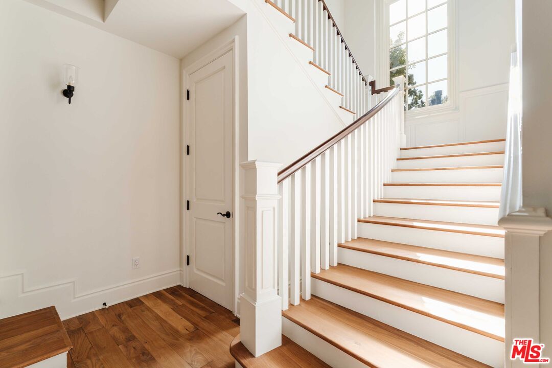 685 San Lorenzo Street Santa Monica, CA 90402 - Photo 19 of 44 a view of entryway with wooden floor and stairs