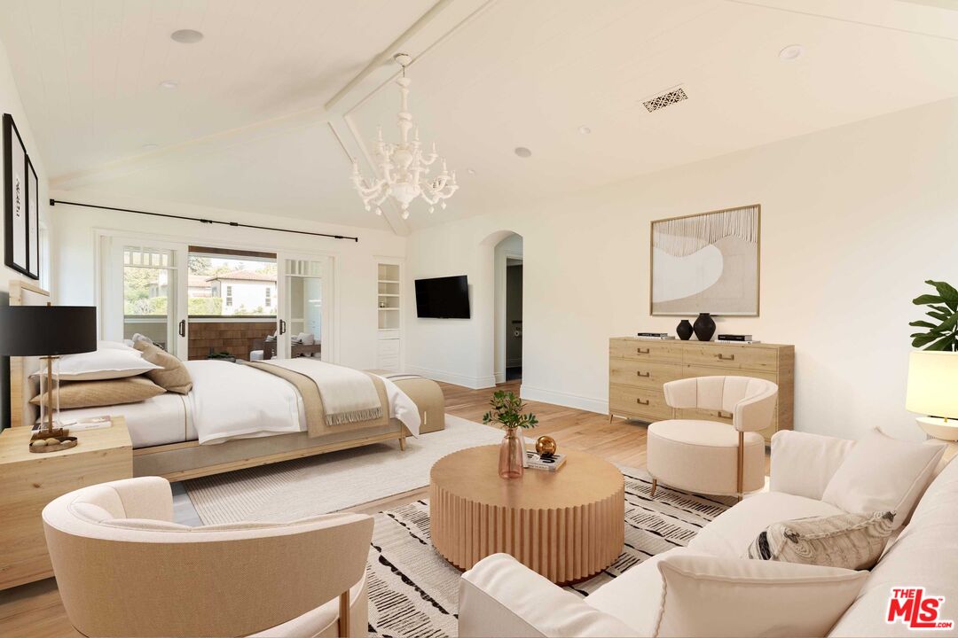 685 San Lorenzo Street Santa Monica, CA 90402 - Photo 24 of 44 a living room with furniture and a chandelier