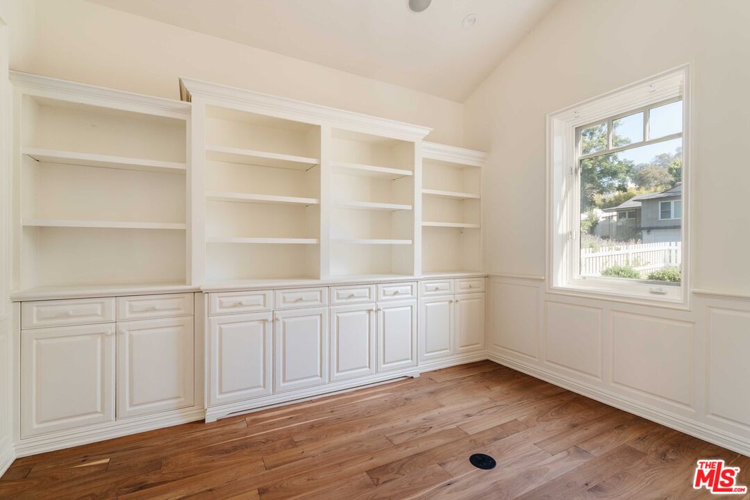 685 San Lorenzo Street Santa Monica, CA 90402 - Photo 37 of 44 a view of an empty room with a window and wooden floor