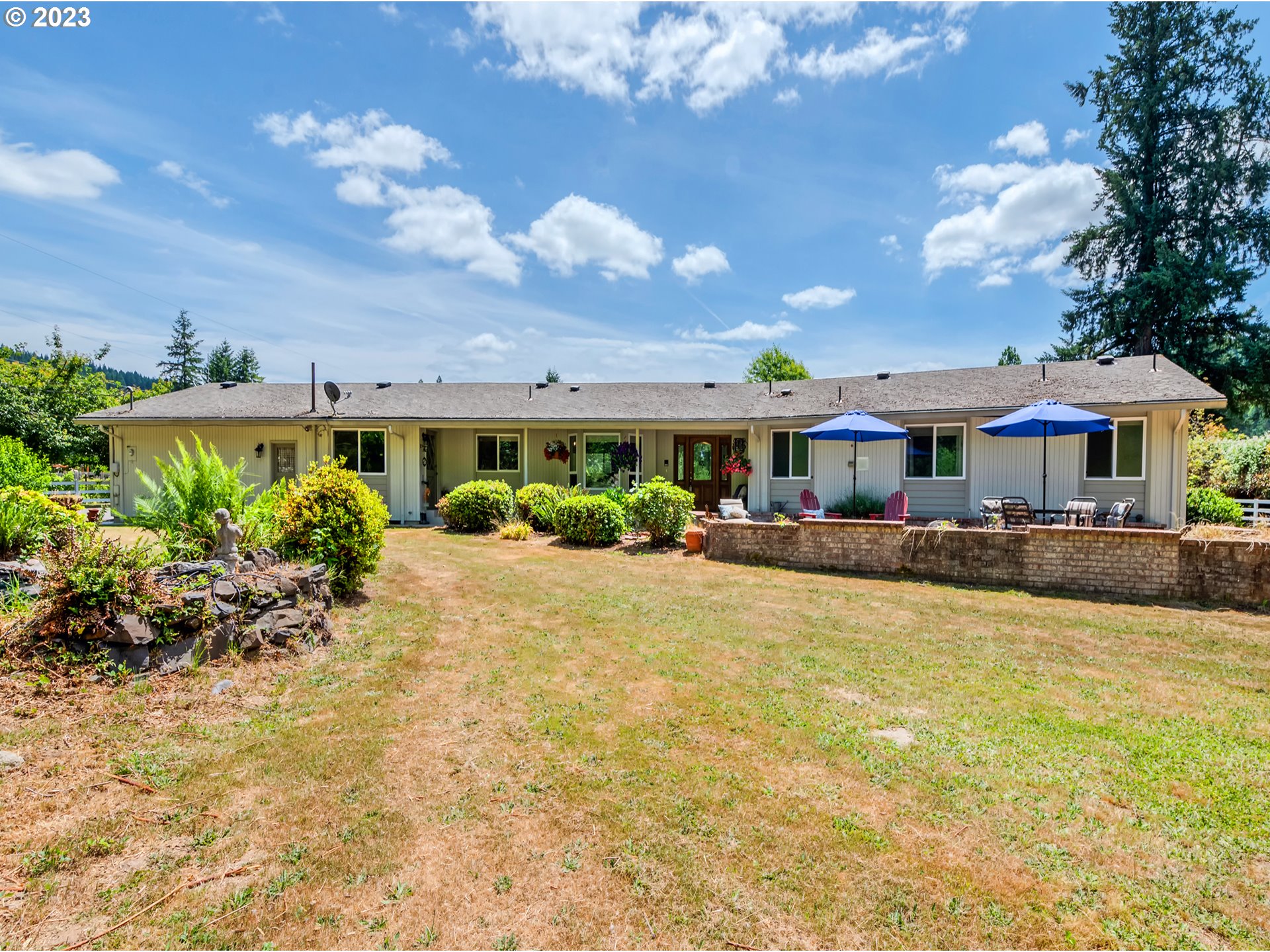 a front view of a house with swimming pool