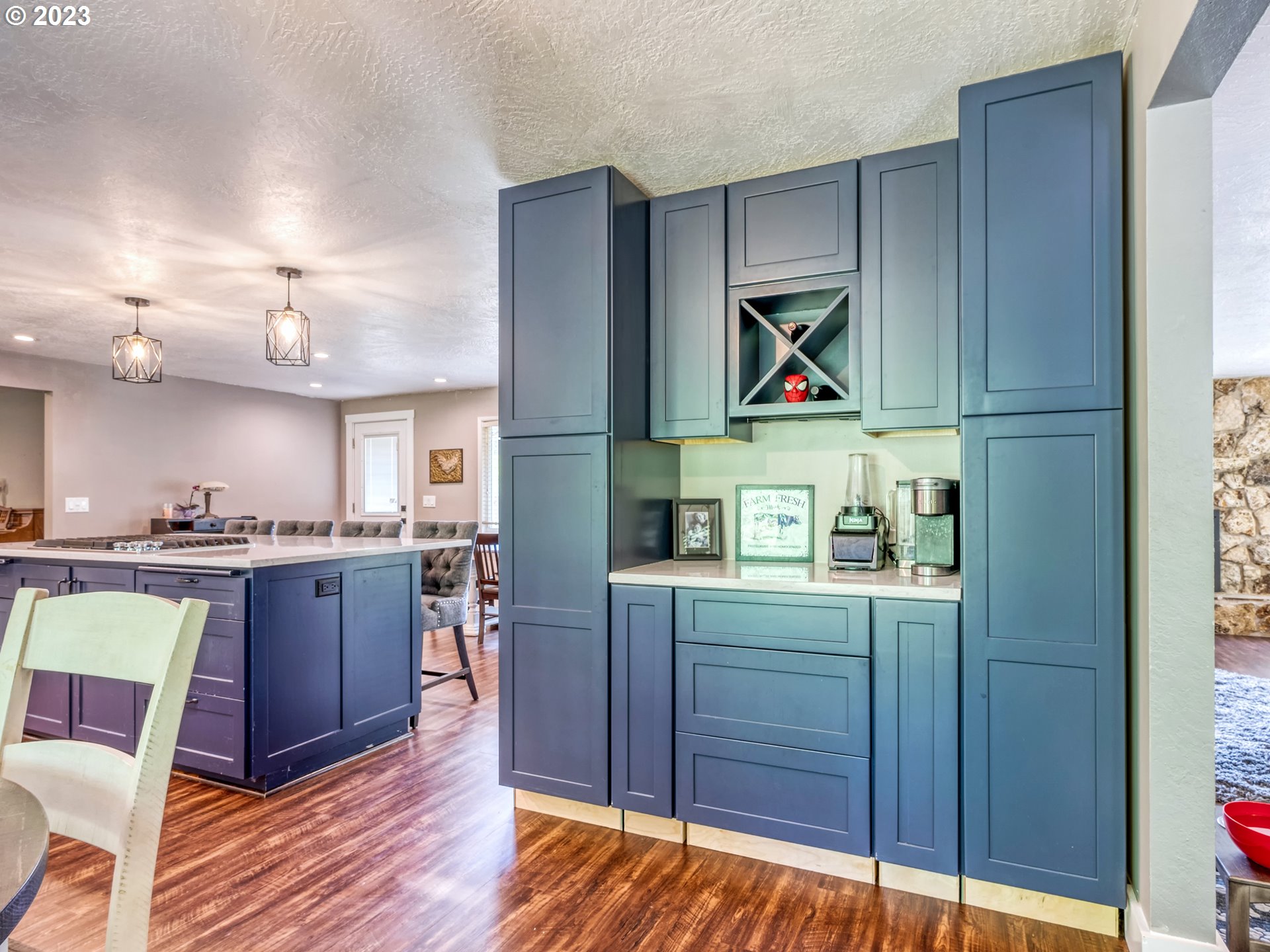 38437 McKenzie Highway Springfield, OR 97478 - Photo 11 of 48 a open kitchen with cabinets and wooden floor