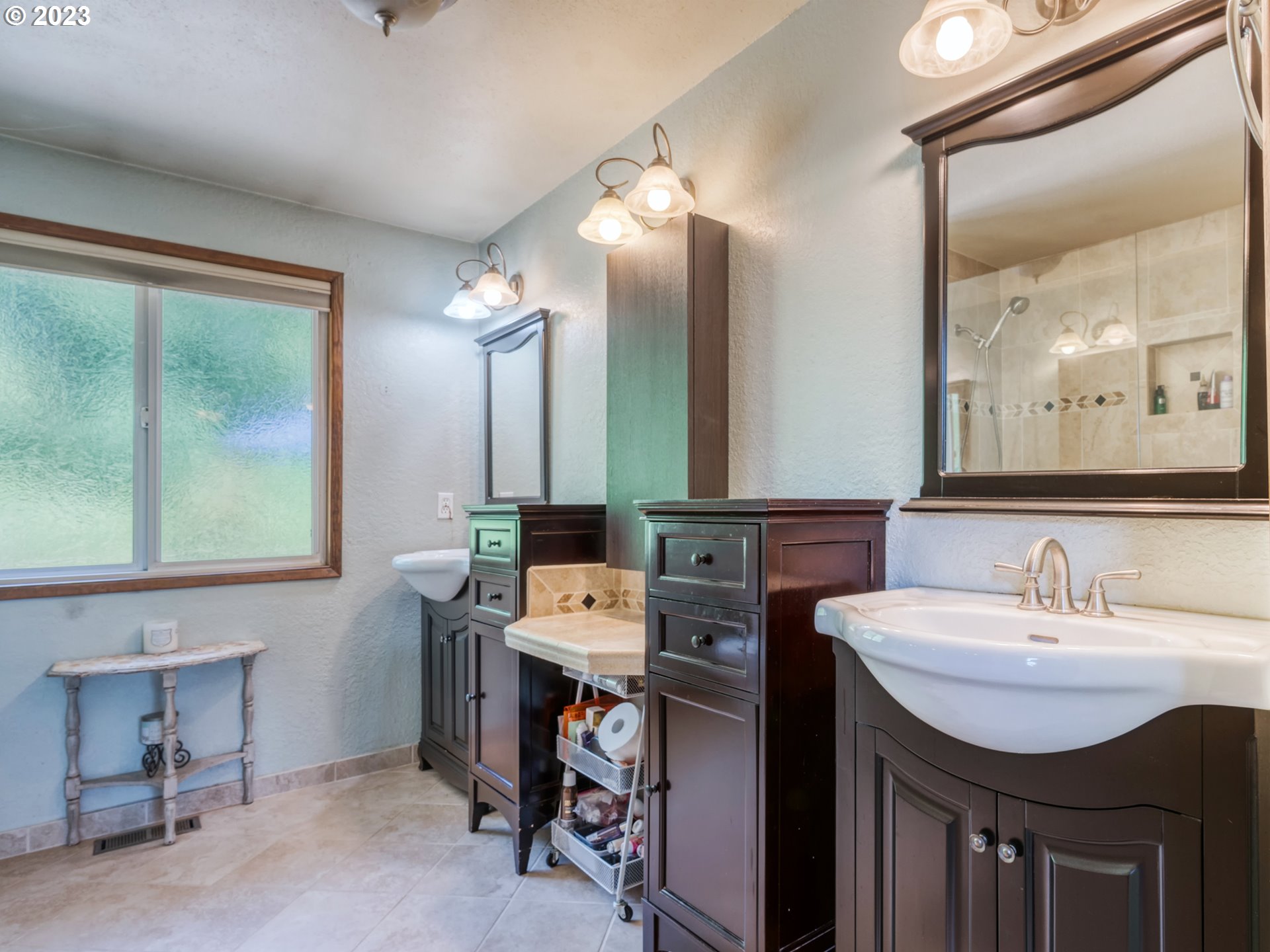 38437 McKenzie Highway Springfield, OR 97478 - Photo 13 of 48 a bathroom with a sink vanity and a mirror