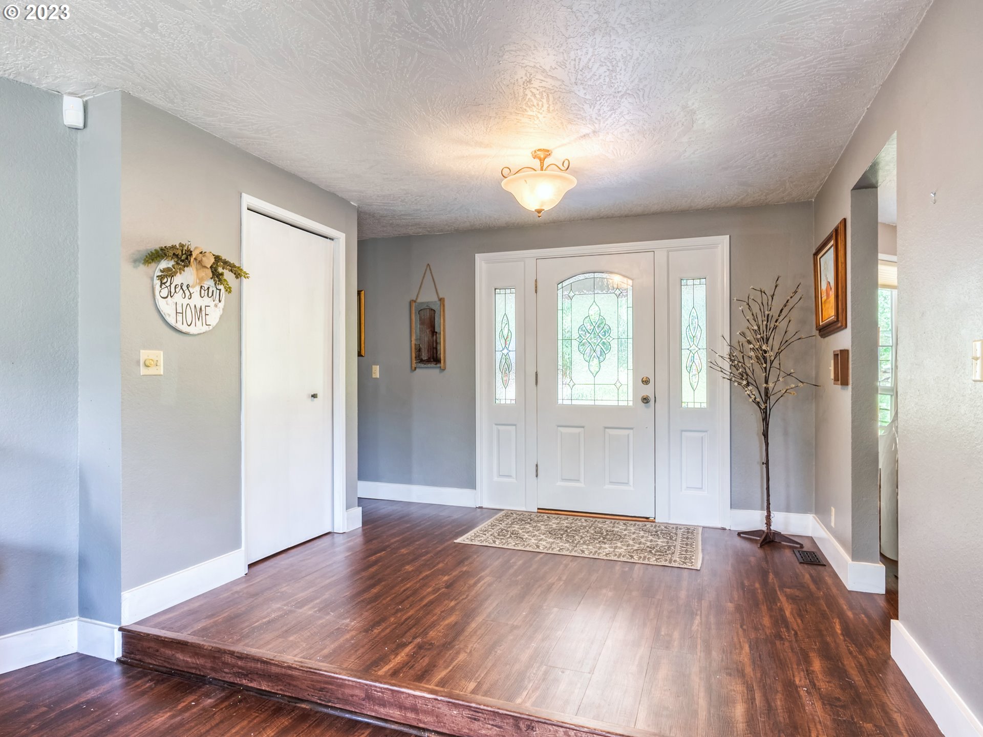 38437 McKenzie Highway Springfield, OR 97478 - Photo 15 of 48 a view of a hallway with wooden floor