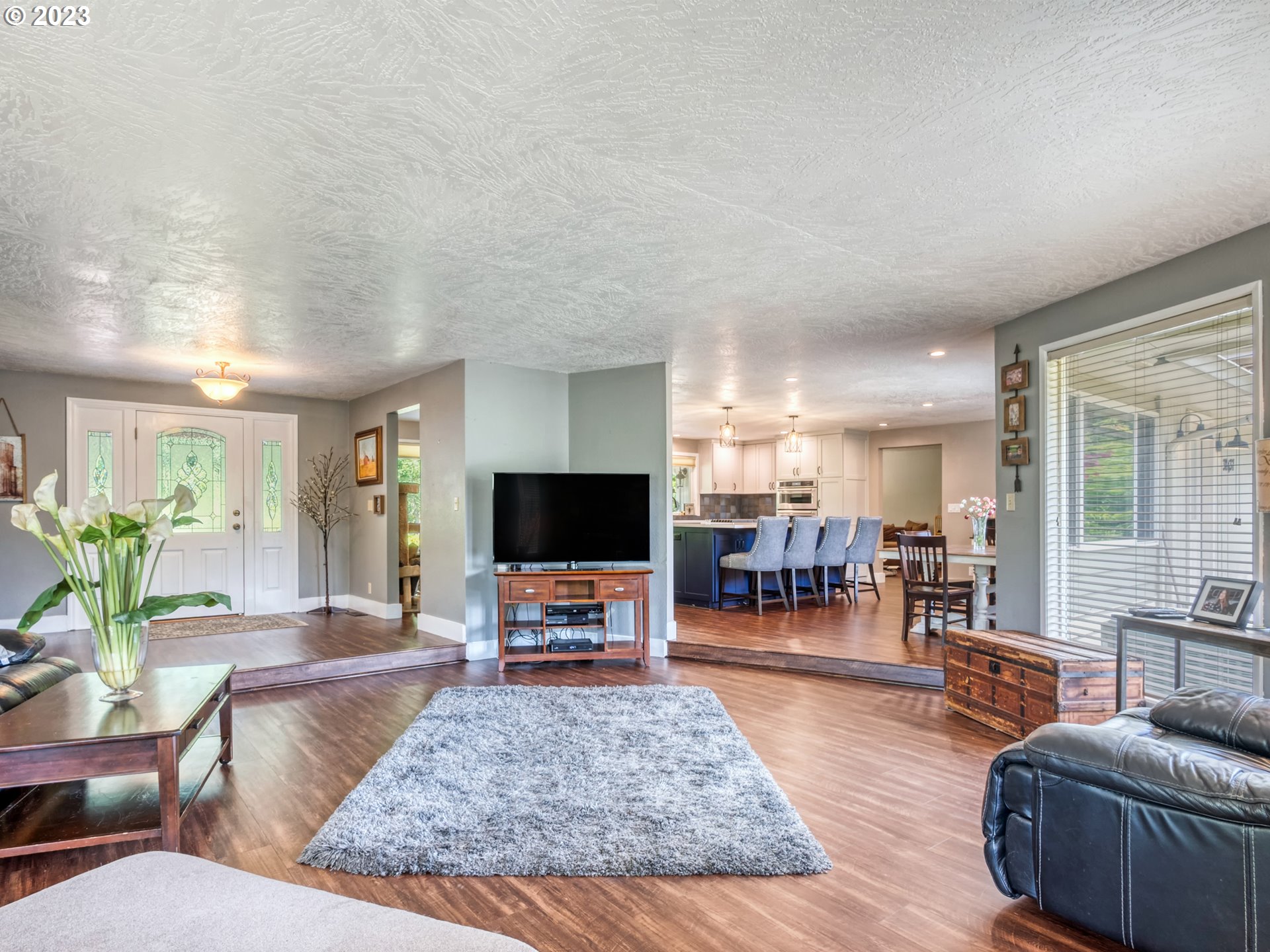 38437 McKenzie Highway Springfield, OR 97478 - Photo 18 of 48 a living room with furniture and a flat screen tv