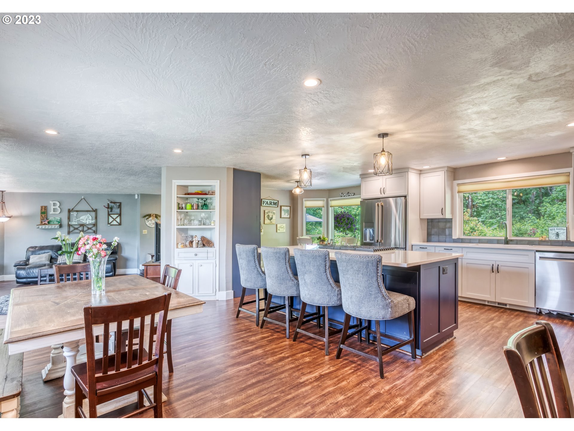 38437 McKenzie Highway Springfield, OR 97478 - Photo 19 of 48 a dining room with furniture window and wooden floor