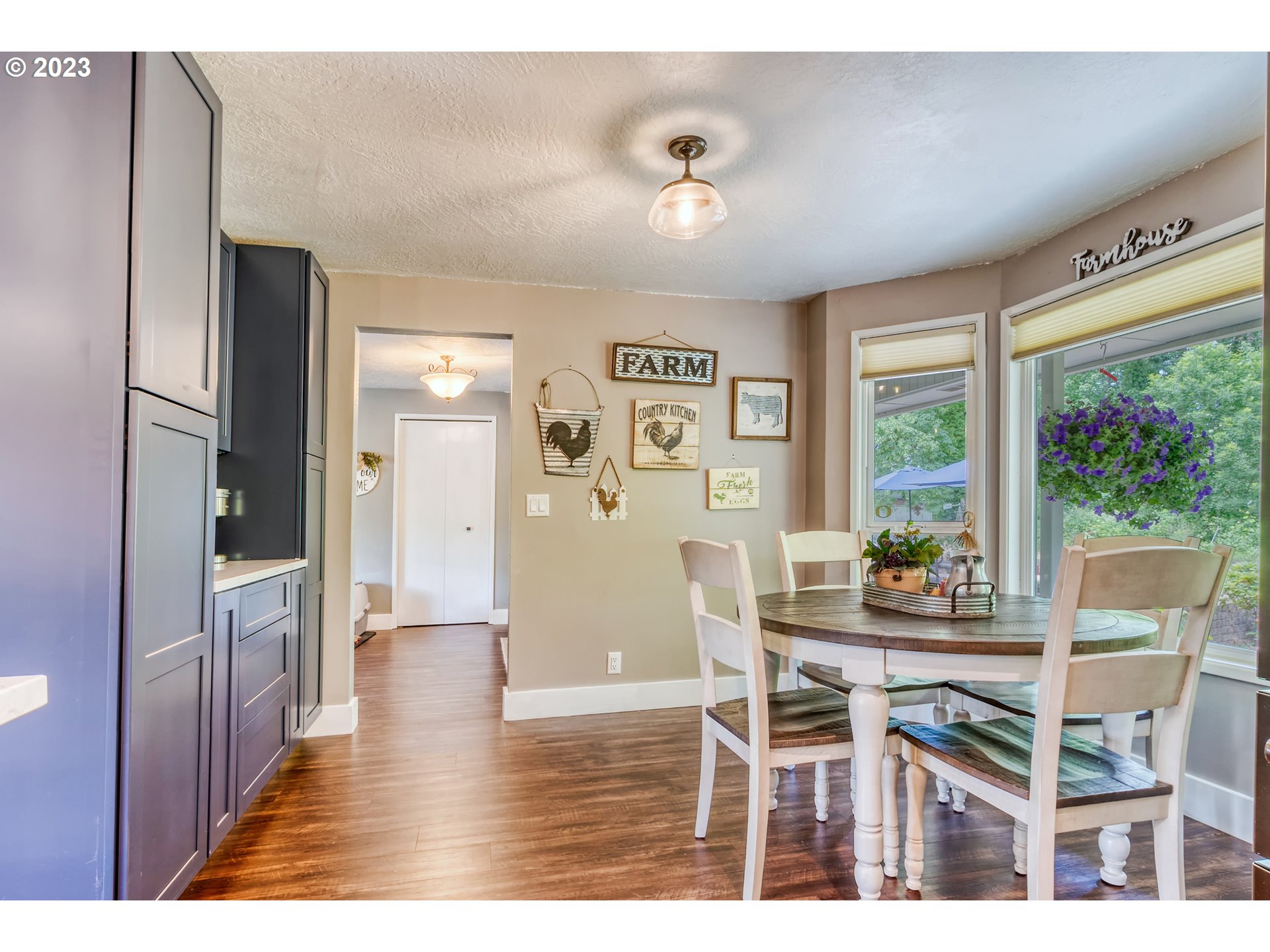 38437 McKenzie Highway Springfield, OR 97478 - Photo 20 of 48 a dining room with furniture and wooden floor