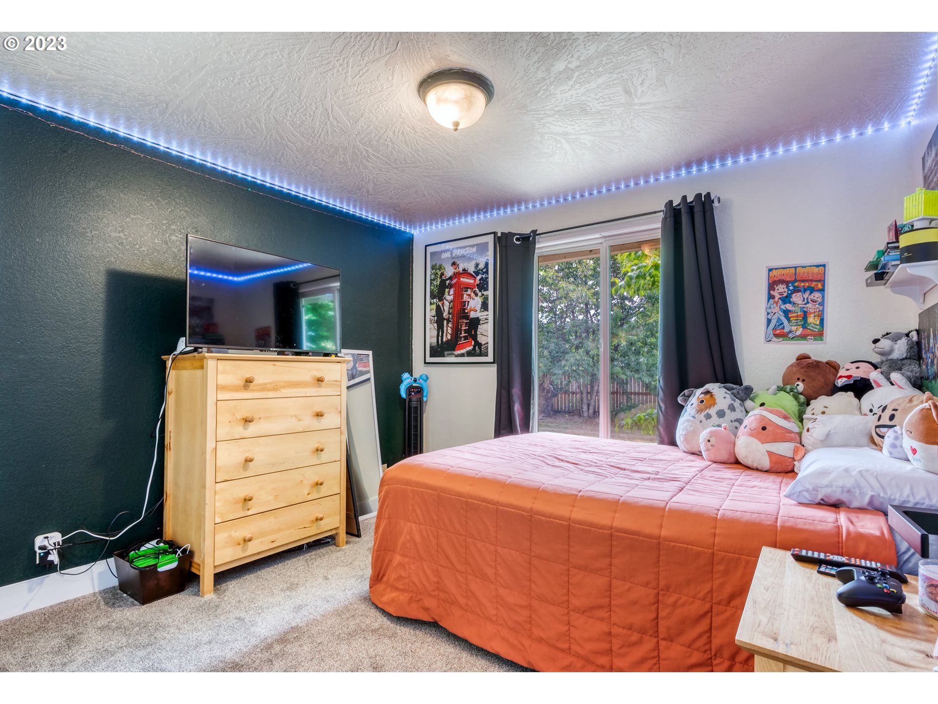 38437 McKenzie Highway Springfield, OR 97478 - Photo 22 of 48 a bedroom with a bed and large windows
