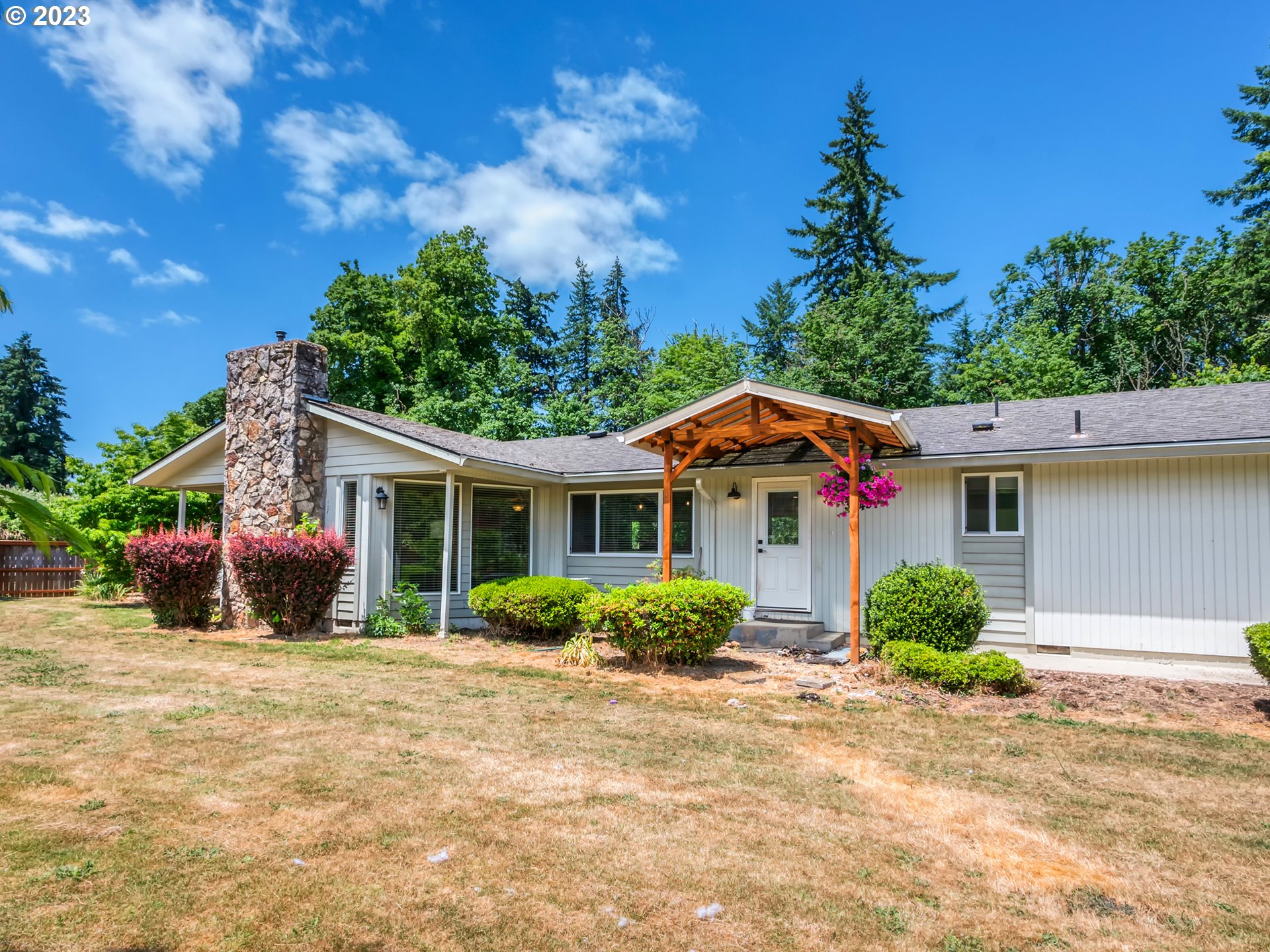 38437 McKenzie Highway Springfield, OR 97478 - Photo 35 of 48 a front view of a house with garden