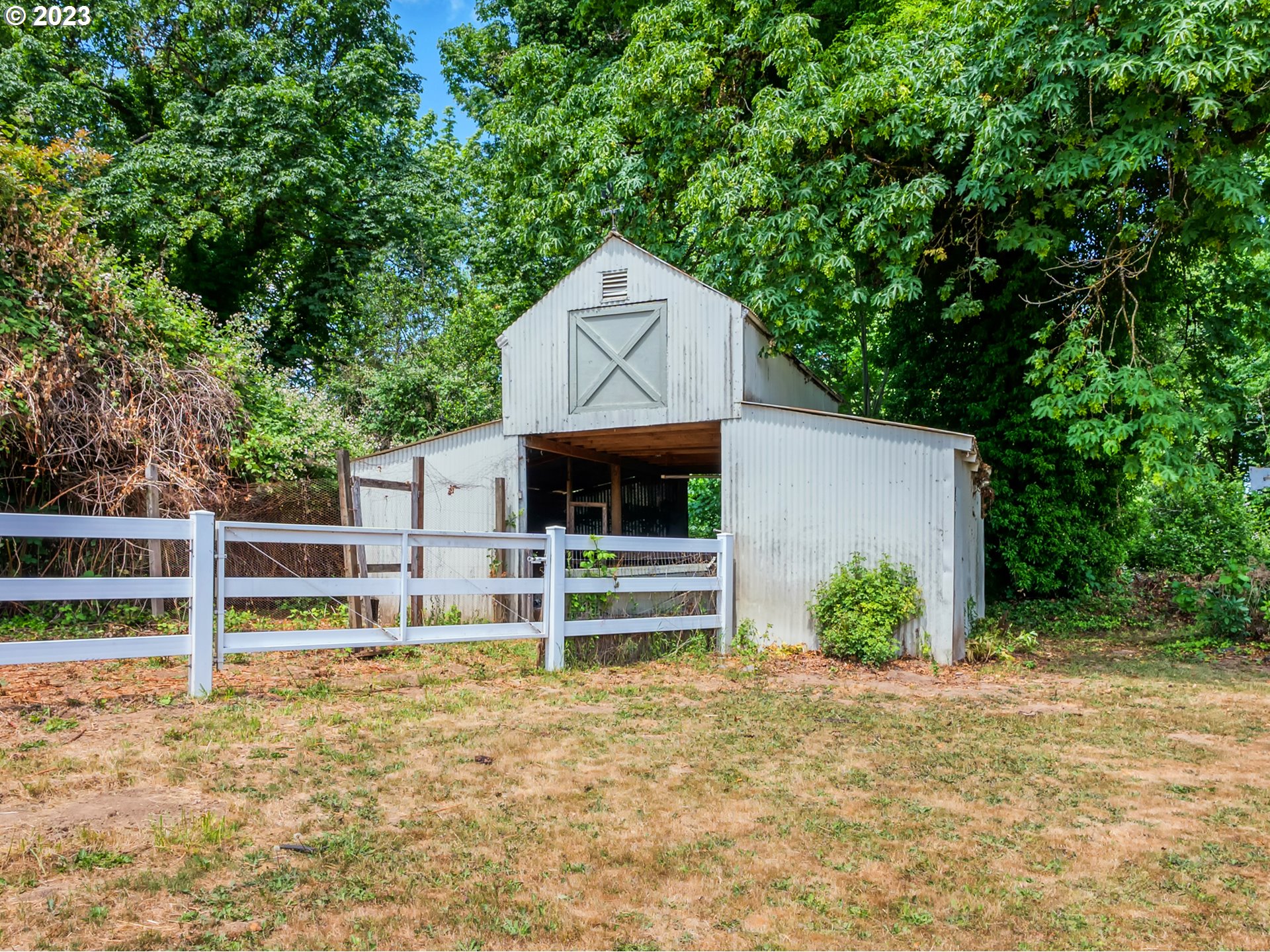 38437 McKenzie Highway Springfield, OR 97478 - Photo 36 of 48 a front view of a house with a yard