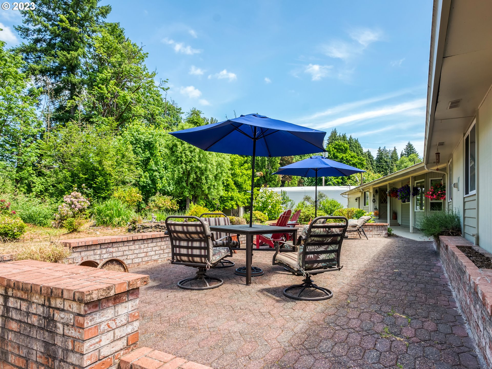 38437 McKenzie Highway Springfield, OR 97478 - Photo 40 of 48 an outdoor space with patio and white umbrellas