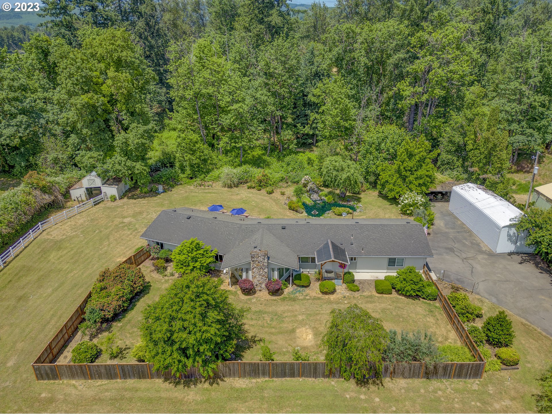 38437 McKenzie Highway Springfield, OR 97478 - Photo 47 of 48 an aerial view of a house with a yard