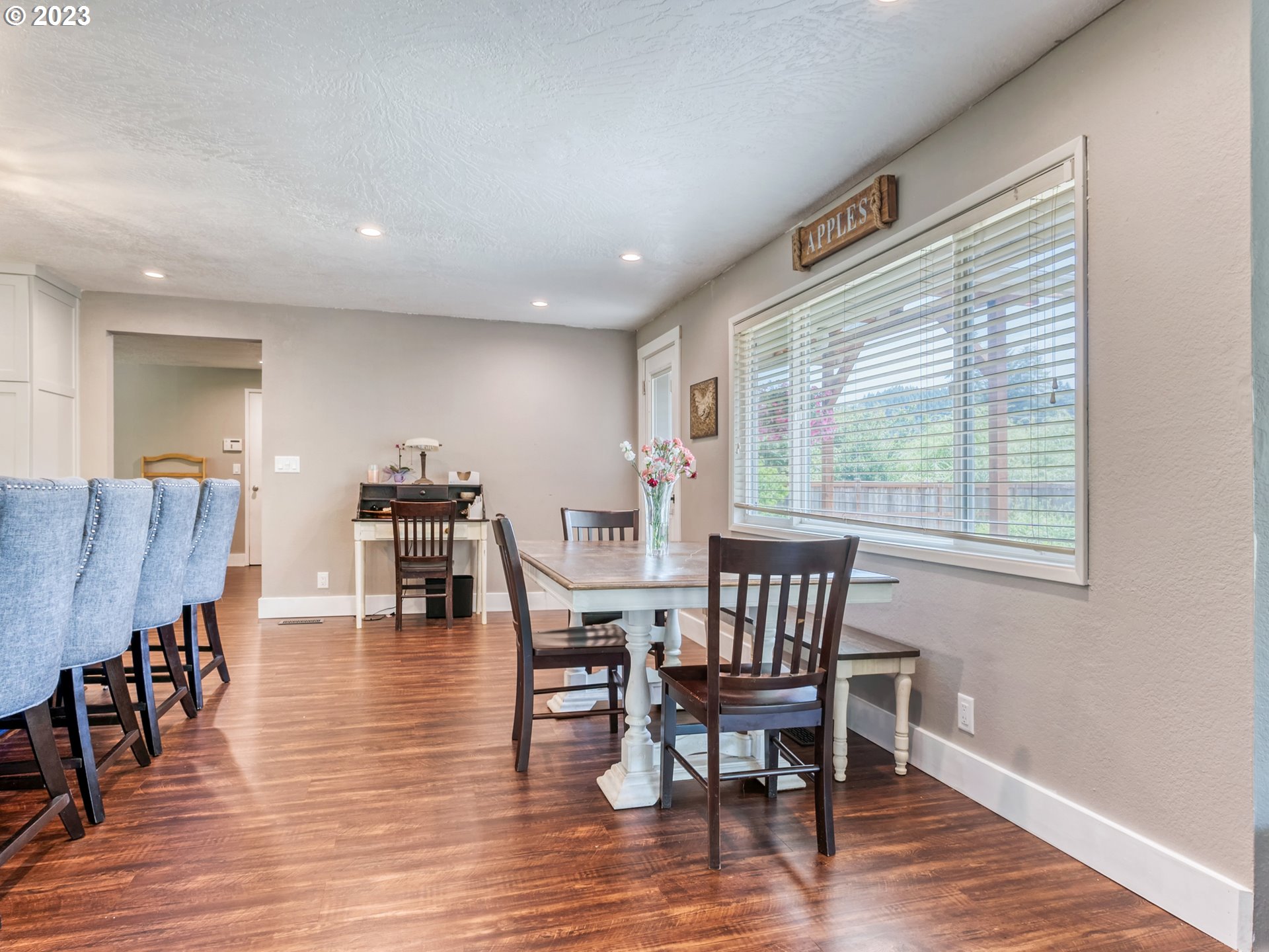 38437 McKenzie Highway Springfield, OR 97478 - Photo 9 of 48 a view of a dining room with furniture and wooden floor