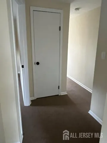 an empty room with a door