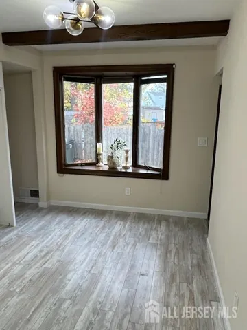 a view of a room that has a window