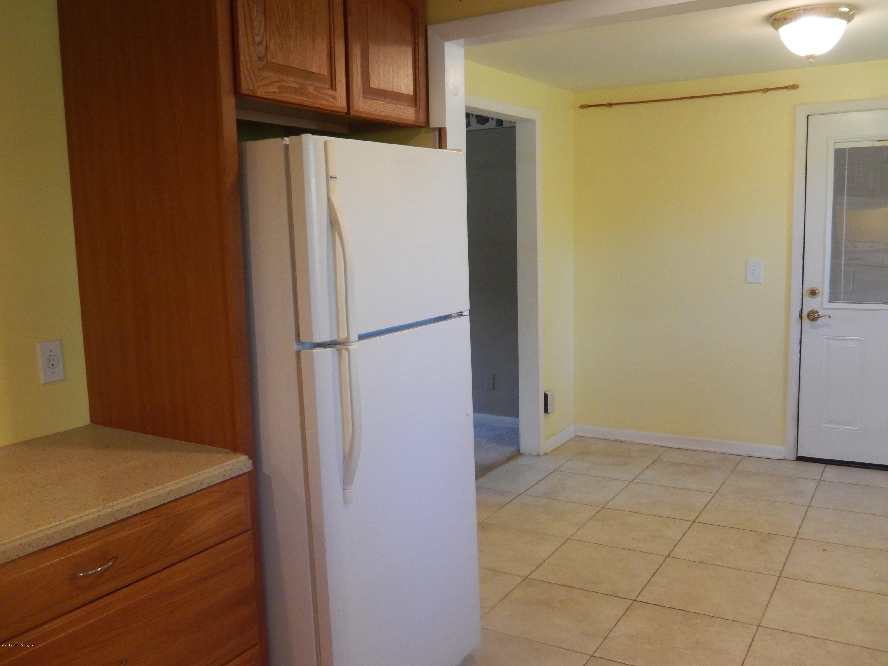 6907 Tampico Road South Jacksonville, FL 32244 - Photo 15 of 55 dining looking into kitchen